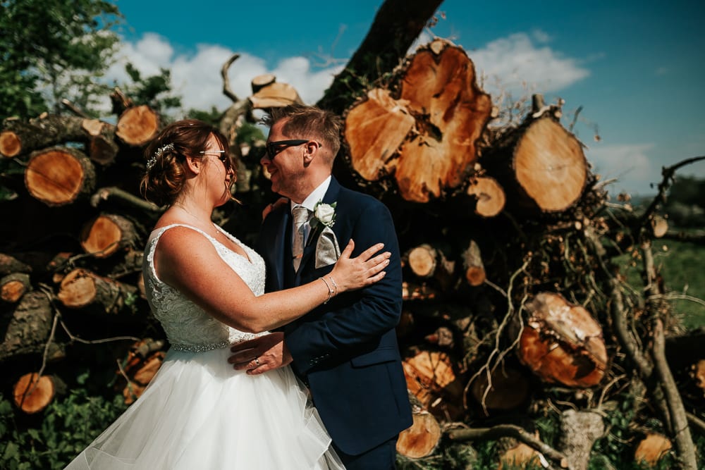 couple by logs
